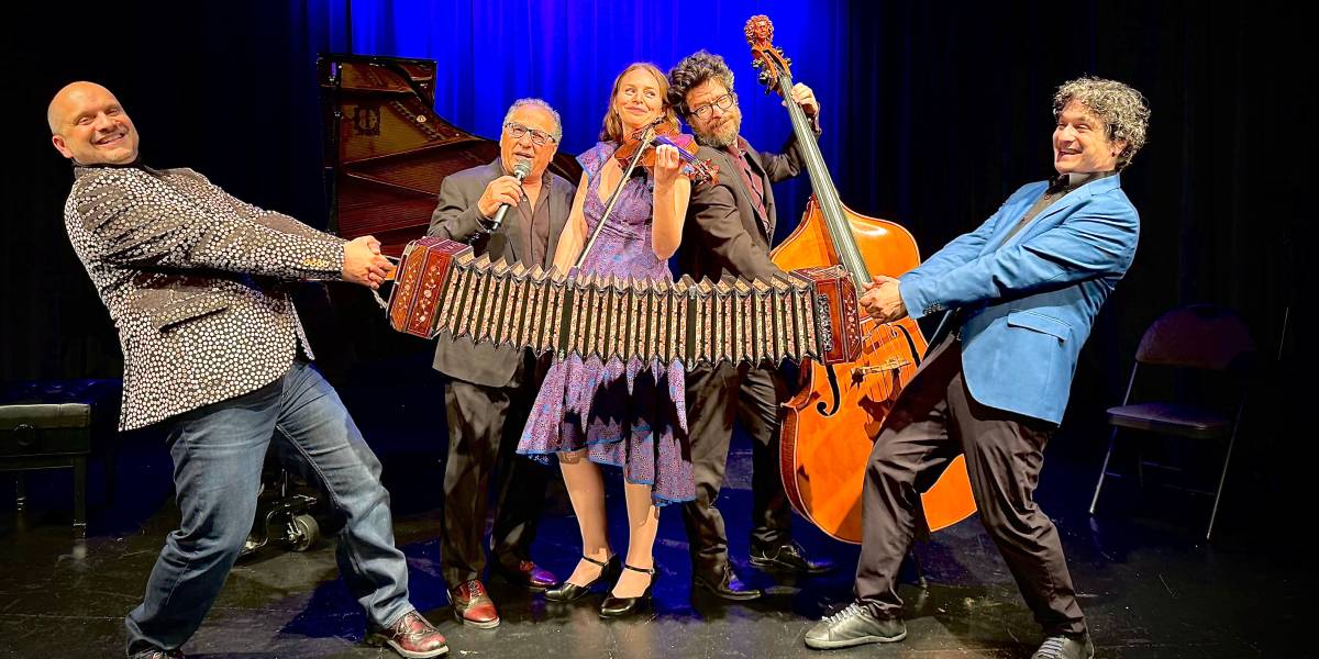Payadora Tango Ensemble with instruments on stage
